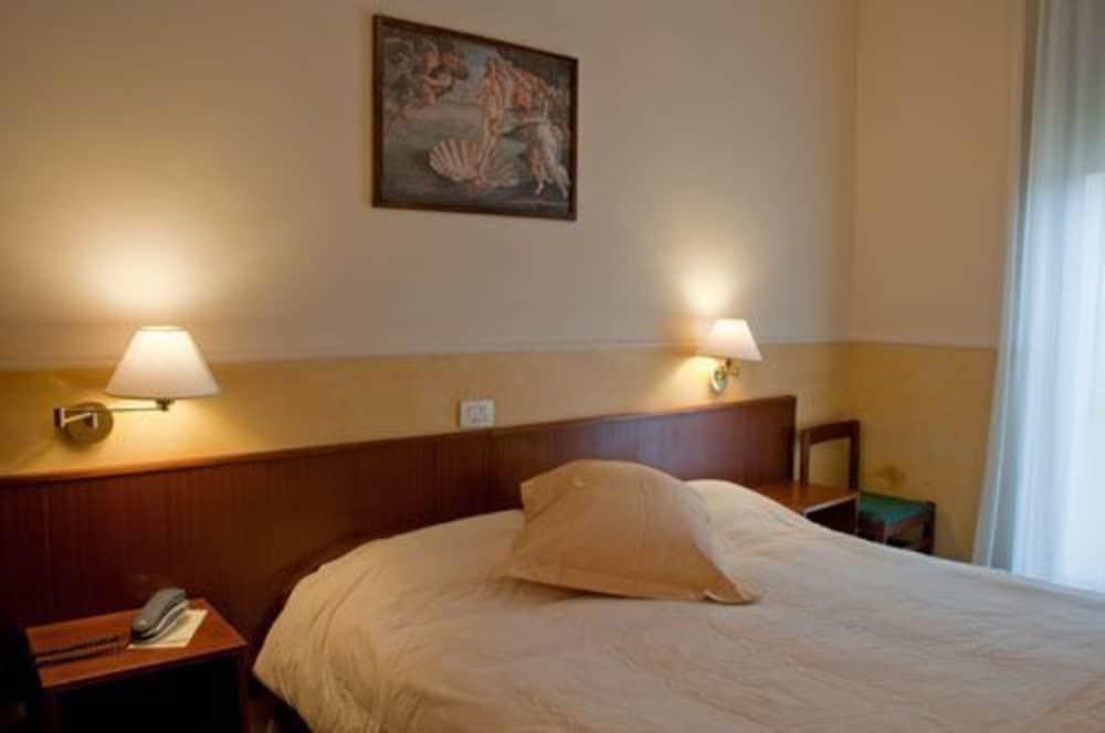 Columbus Urban Resort ฟลอเรนซ์ ภายนอก รูปภาพ A room at the hotel