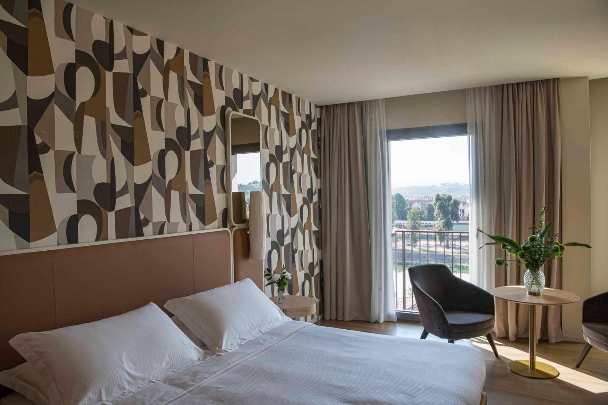 Columbus Urban Resort ฟลอเรนซ์ ภายนอก รูปภาพ A room at the hotel