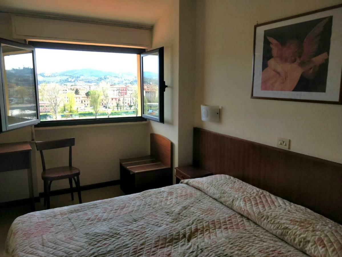 Columbus Urban Resort ฟลอเรนซ์ ภายนอก รูปภาพ A room at the hotel